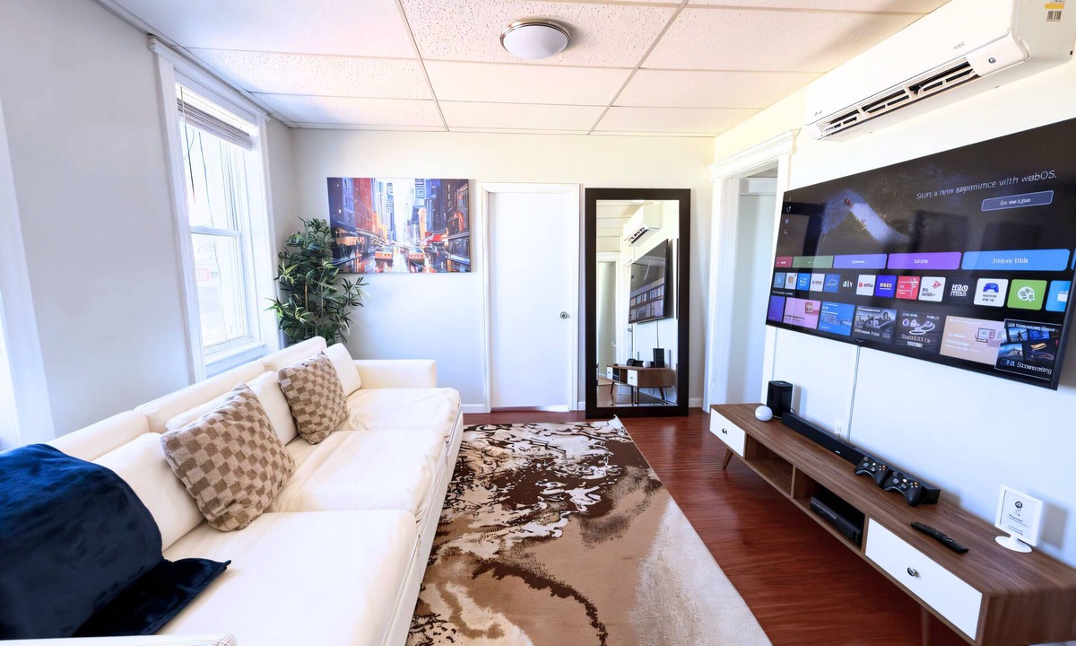 West New York Apartment | 3BR Smart Home Apartment Sleeps 11 20 Min to Times Sq