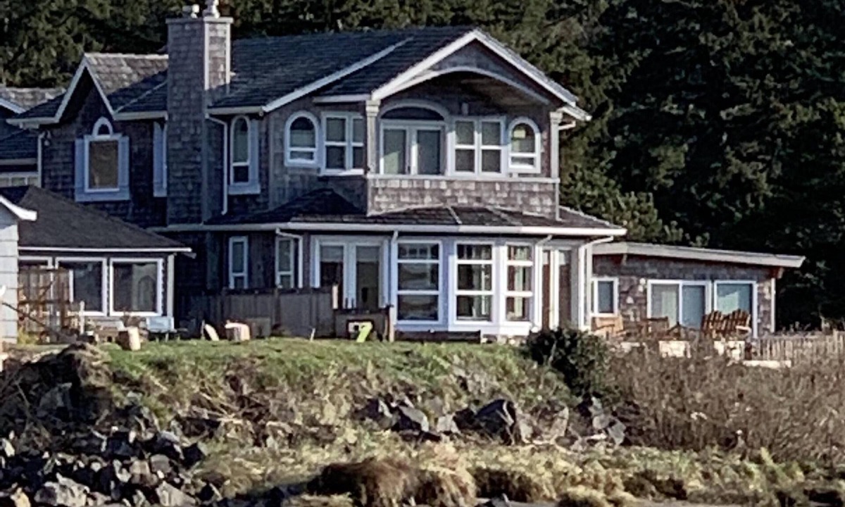 Cannon Beach House | Amazing estuary and ocean views! Relax on the deck with the fire-pit & jacuzzi