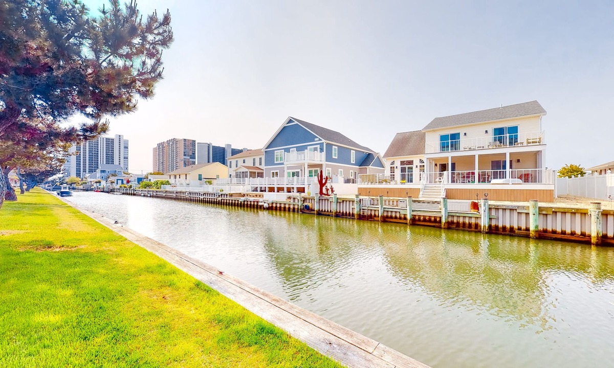 North Ocean City Condo | Canal-Front Retreat w/Pool - Walk to Beach & Restaurants