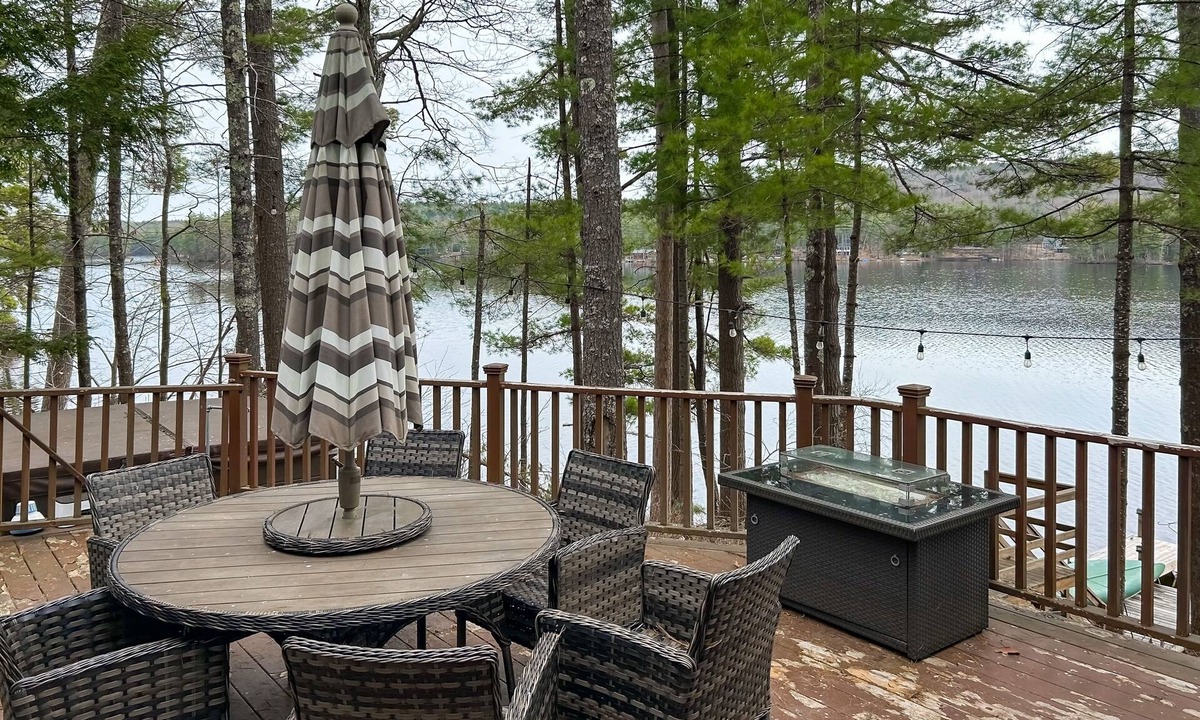 Pine River Pond House | Central lakefront house with private hot tub, dock, patio bar, & beach access