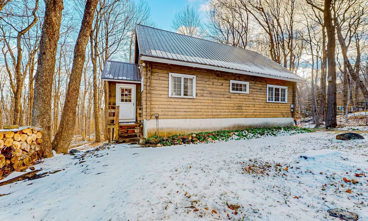Wilmington Cabin | Classic Vermont cabin with forest views, woodstove, pools, hot tub & gym