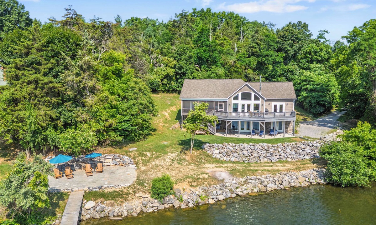 Pulaski House | Experience the perfect blend of rustic charm and modern luxury in this Claytor lakefront retreat