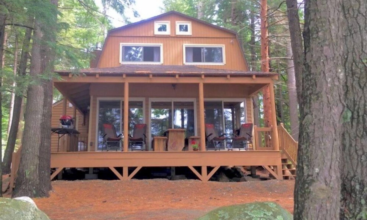 Belgrade House | Famous cottage directly on 100' private shoreline of pristine lake.