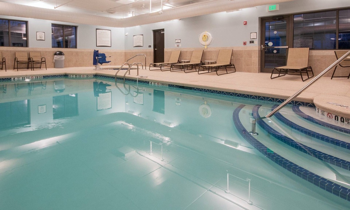 Amherst Condo | Free Daily Breakfast. Pool, Hot Tub & Gym Access.