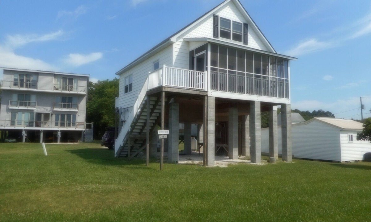Chincoteague House | Great Water Views in quiet pet-friendly location facing lighthouse. Large Yard