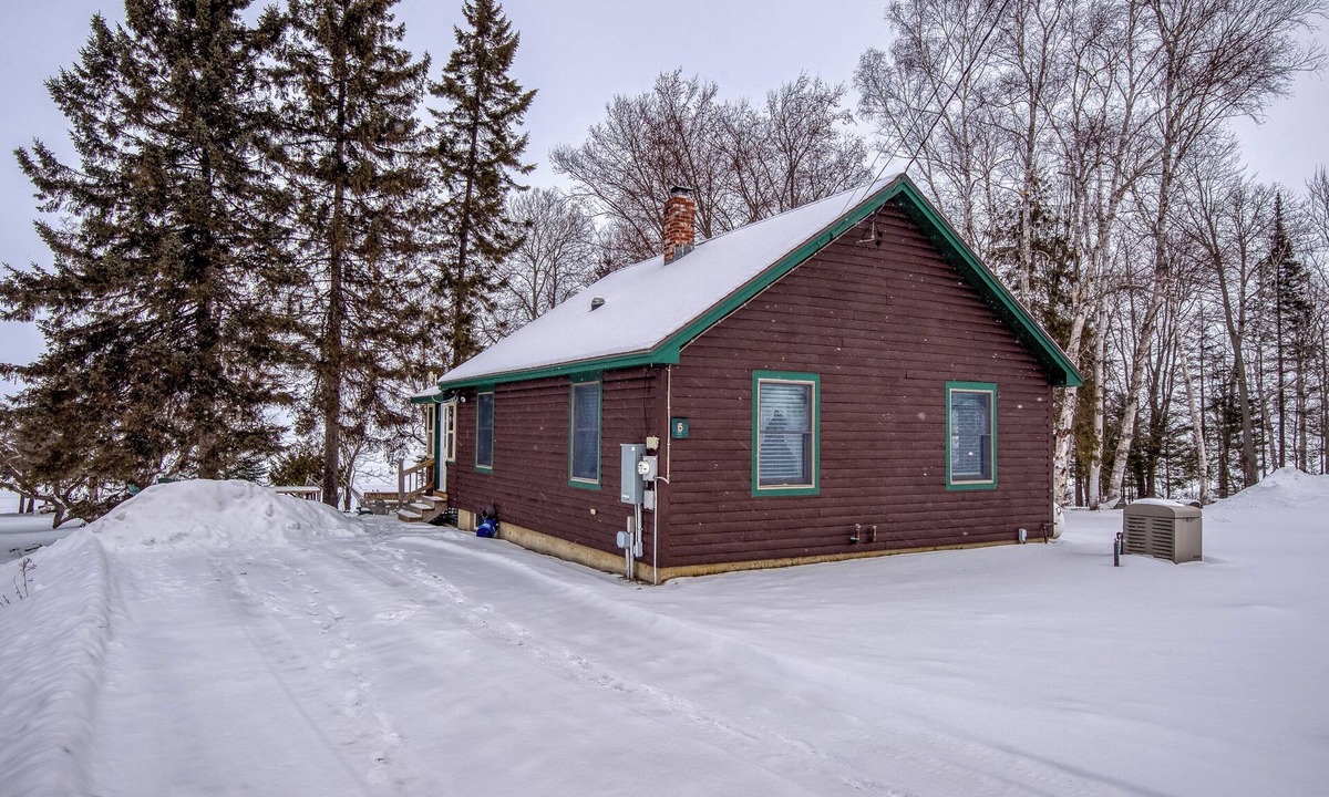 Rangeley Plantation Cabin | Niboban Cabin 5 right on Rangeley Lake with a screened porch, fire pit, hammock, WiFi and dock!