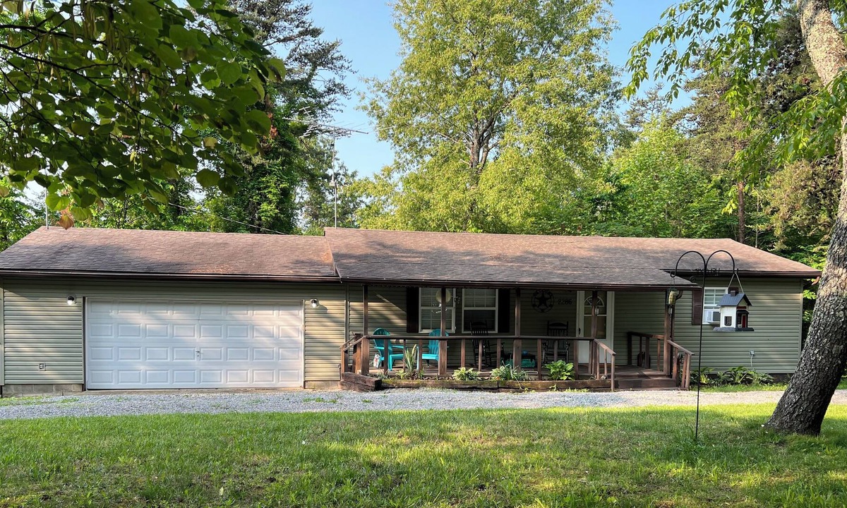 Wakefield House | Quiet & cozy retreat with firepit, front porch, back balcony, walk-in tub & more