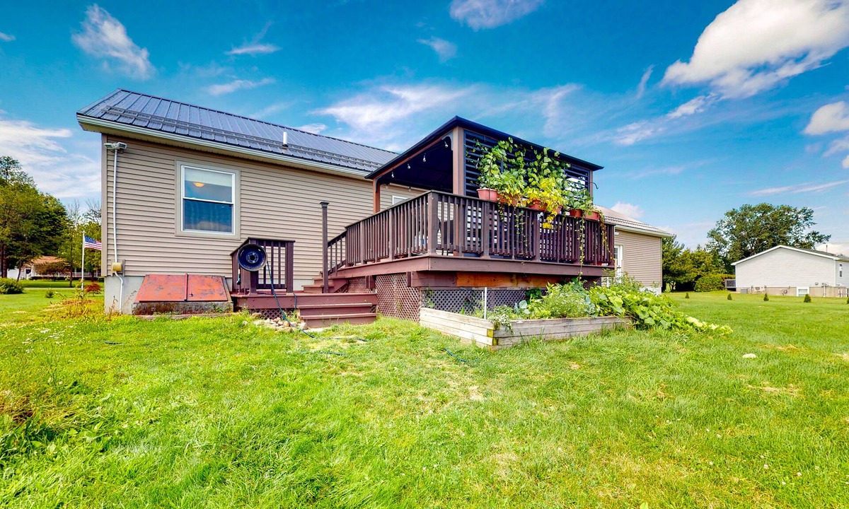 Penn Yan House | Relaxing two-story home with a deck, firepit, game room, & washer/dryer