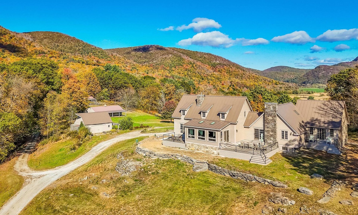 Pawlet House | Riverfront estate, mountain views, dog-friendly, fireplace, balcony, w/d, wifi