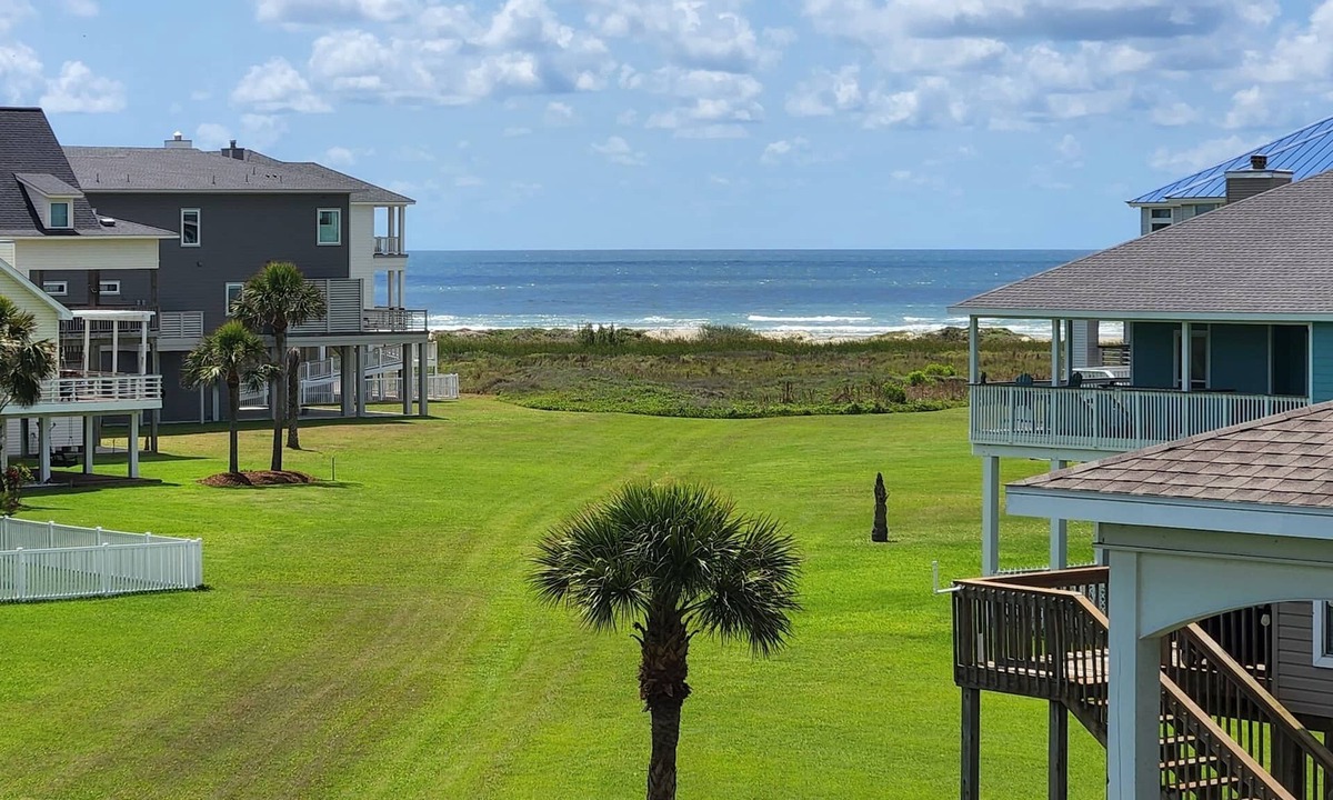 Pointe San Luis House | Sea Turtle Tango- Close to beach! Community Pool!