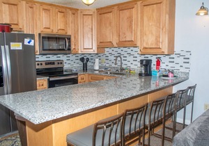 D104 · Winterplace Ski in Ski out condo First floor! D104