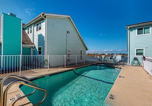 Dog-friendly condo with WiFi, hot tub, & pool - minutes from beach