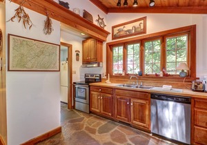 Dog-friendly Lakefront Log Home on a Quiet Cove with Front Deck & Private Dock