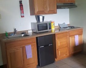 Oyster Bay Inn Suites | West Hills