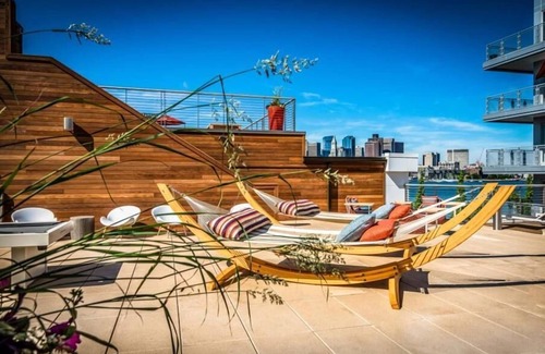 Central-Maverick Square - Paris Street House | Beautiful Studio | Furnished | Rooftop Deck w/Water Views | GLS