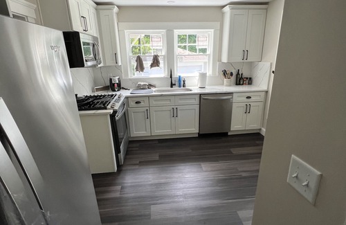 Framingham House | Cheerful entire house with 3 bedrooms and work area.