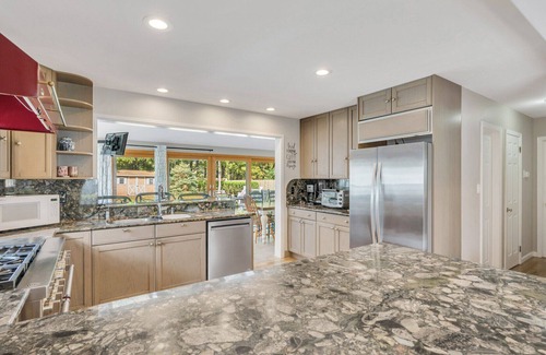 Greenport West House | Colonial-Style Home on 0.48 Acres, Spacious Living and Entertaining Areas,...