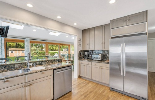 Greenport West House | Colonial-Style Home on 0.48 Acres, Spacious Living and Entertaining Areas,...