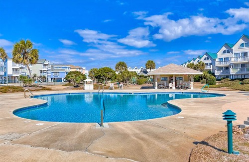 Fort Morgan Condo | Colorful, lofty condo with balcony, beach access, pools, hot tubs & tennis