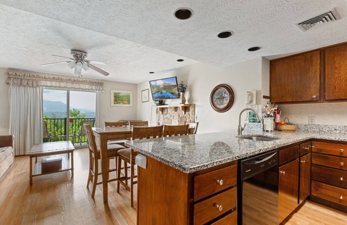 Gatlinburg - Pigeon Forge Condo | Deer Ridge E108 | Balcony, Resort Pools, Tennis + Picnic Area