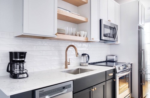 North Brookline Apartment | Elegant Brookline 1BR w/Gym & W/D, steps to Green Line, by Blueground