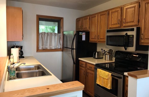 Southwest Harbor Condo | Enjoy the stunning ocean view from the hot tub!