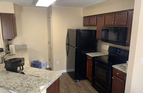Berkeley Condo | Enjoy Williamsburg from your modern 4BR/4BA at Greensprings Resort. Great value.
