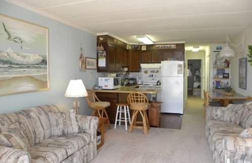 North Ocean City Condo | Ocean Front, private porch, full kitchen w/dishwasher, wifi, North Ocean City steps from the beach!