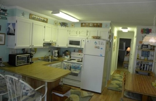 North Ocean City Condo | Ocean Front, private porch, full kitchen w/dishwasher, wifi, North Ocean City steps from the beach!