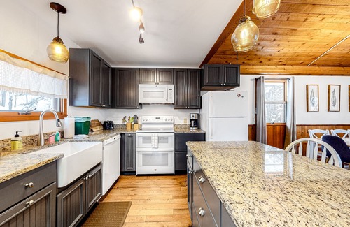 Warren House | Remodeled ski chalet with wood stove, on shuttle route between two ski mountains