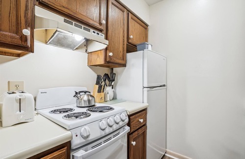 West Bridgewater House | 106 One bedroom Queen Suite on the 1st floor w/outdoor heated pool