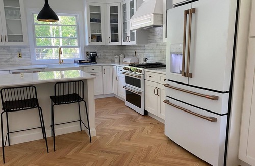 East Marion House | 4-bed 3.5-bath house with fenced heated pool and hot tub, fire pit, kids swings