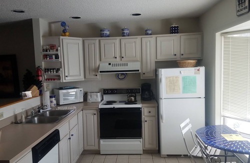 McHenry House | 4 level townhome is steps away from WISP ski slopes. Sleeps 10, 3BA. Fireplace