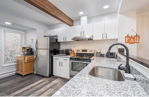 McHenry House | 4 Seasons Wisp - Ski In/Ski Out Townhome with Lake Access, Hot Tub