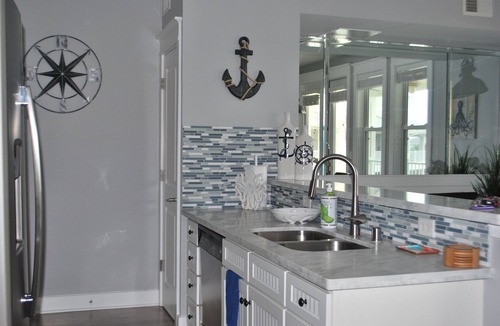 Red Fish Cove Condo | Beachfront, top floor condo steps away from Pointe West Beach Club and beaches.