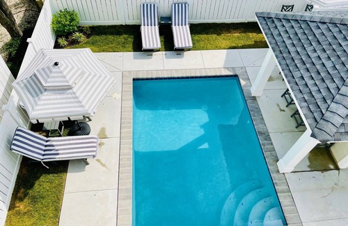 Avalon House | Beautiful new home, professionally decorated with pool close to town and beach