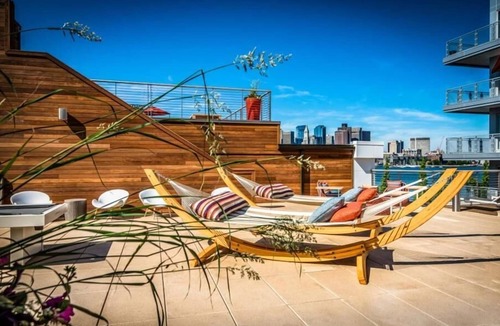 Central-Maverick Square - Paris Street House | Beautiful Studio | Furnished | Rooftop Deck w/Water Views | GLS