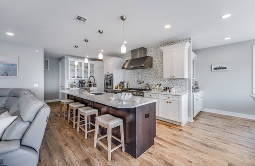 Osbornsville House | Beautiful waterfront 8-BR house w pool patio, outdoor bar, dock, putting green!
