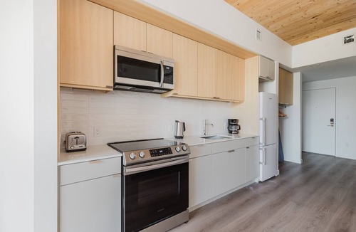 East Somerville Apartment | Blueground | Somerville, gym & AC, nr Assembly