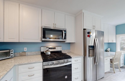 Warren Condo | Bright, mountain escape with pool, hot tub, fireplace, modern kitchen & balcony