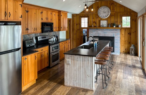 Pine River Pond House | Central lakefront house with private hot tub, dock, patio bar, & beach access
