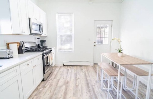West Side House | Charming 3-bedroom, 1.5-bath house with king bed. Easy access to NYCn