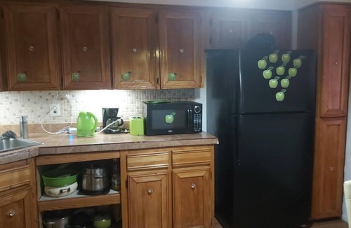 Queens House | Charming 4-bedroom, 2 bath, balcony townhome in Queens