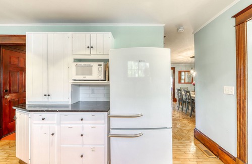 South Hero House | Charming Farmhouse with Porch, Covered Deck, and Large Lawn - Dogs Welcome