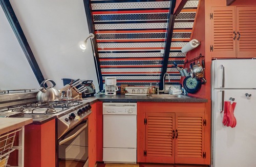 West Townshend House | Charming gingerbread A-frame situated on 3 acres, woodstove, A/C, deck
