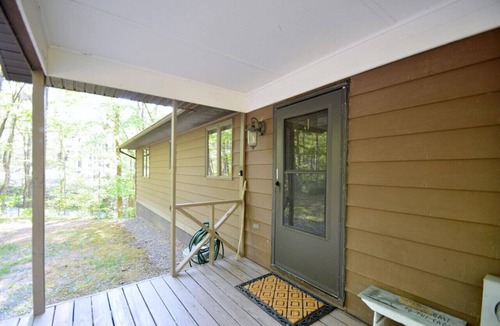 Great Cacapon House | Chesnutt Cabin - riverfront, fire pit, fireplace, game room, king bed