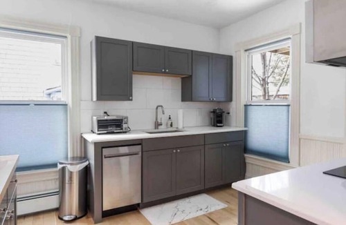 Old North End Apartment | Cityscape Sanctuary: parking+laundry