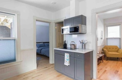 Old North End Apartment | Cityscape Sanctuary: parking+laundry