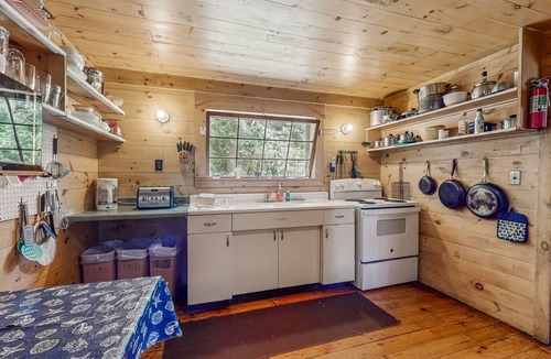 Charlotte Cottage | Classic lakefront cabin with screened-in porch & great views - dogs welcome