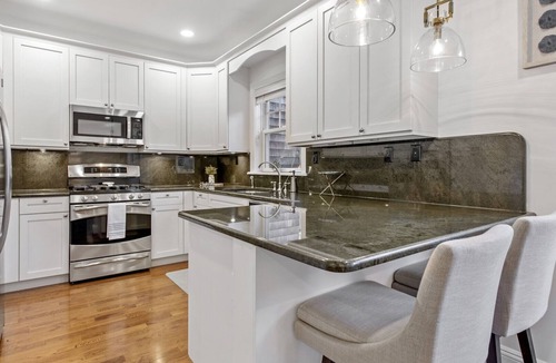 Shinnecock Hills House | Classic townhome with a luxury feel, perfect for relaxing after a day at.